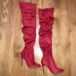 Red knee high ruffled boots